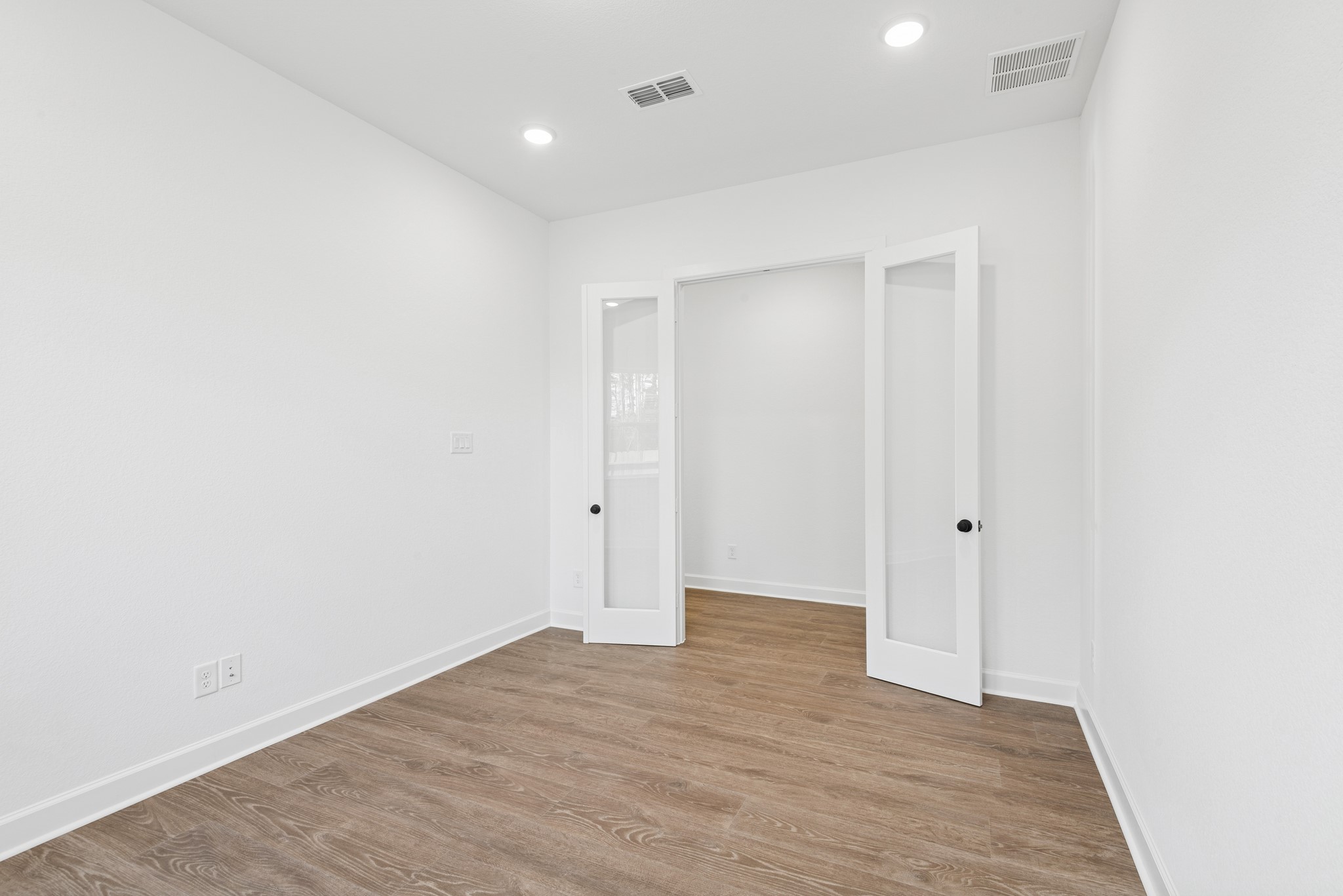15714 Terracotta Terrace Lane Conroe, TX 77302 - Photo 17 of 47 a view of an empty room