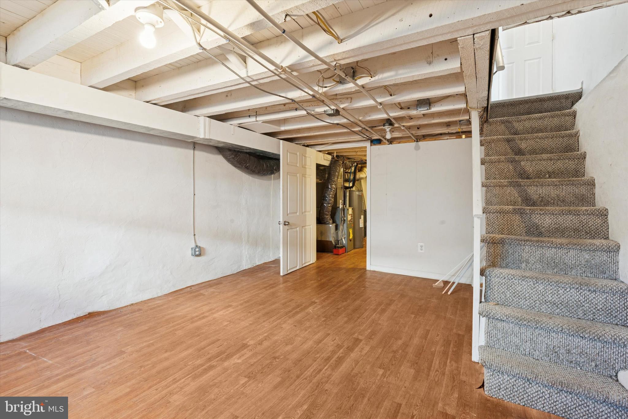 102 Daly Street Philadelphia, PA 19148 - Photo 20 of 25 a view of an empty room with wooden floor