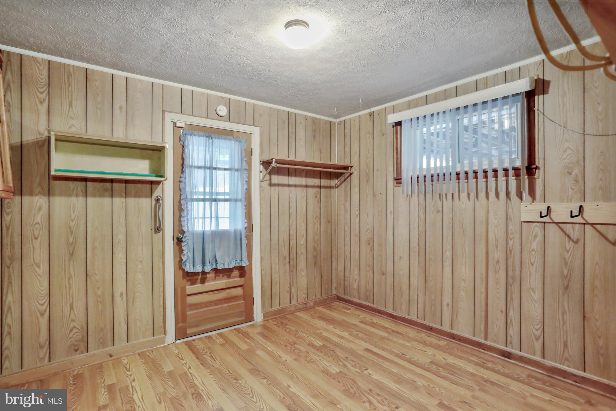 208 Fulton Street Hancock, MD 21750 - Photo 19 of 33 a view of an empty room with a window