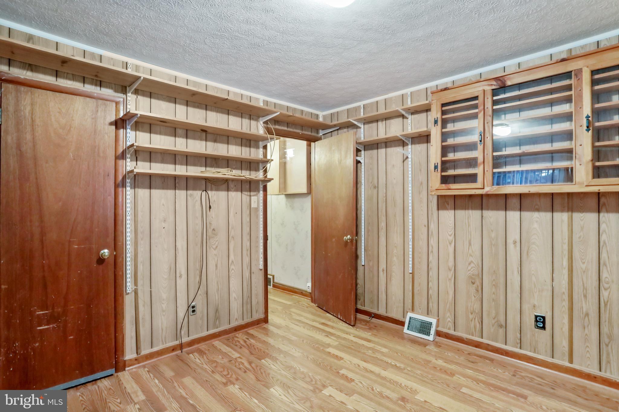 208 Fulton Street Hancock, MD 21750 - Photo 20 of 33 a view of a hallway with wooden floor and closet