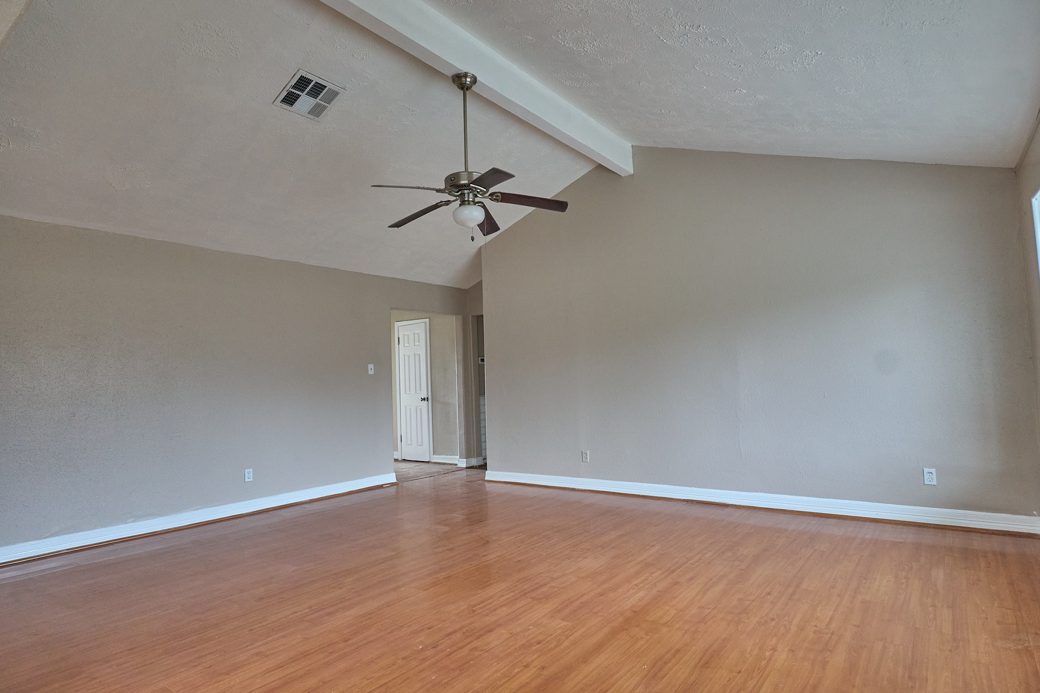 15829 Ridgeroe Lane Houston, TX 77053 - Photo 5 of 16 a view of a room with wooden floor and fan