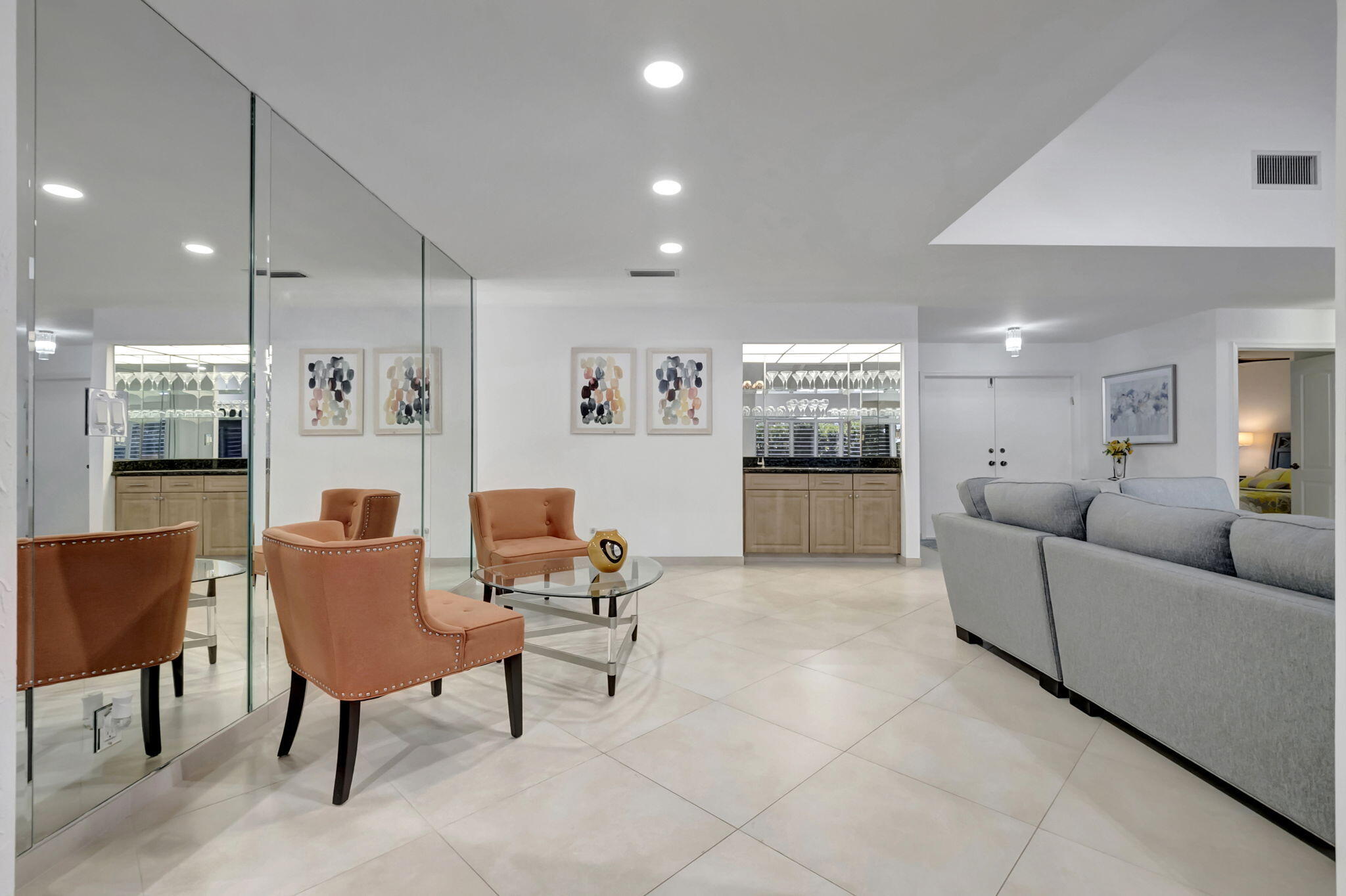 902 Foxpointe Circle Delray Beach, FL 33445 - Photo 13 of 43 a living room with furniture and kitchen view