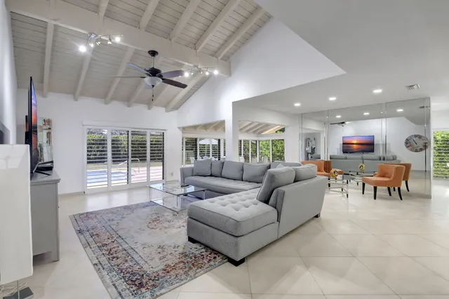 a living room with furniture and a table