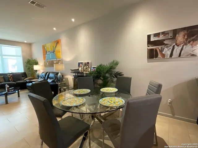 a view of a dining room with furniture