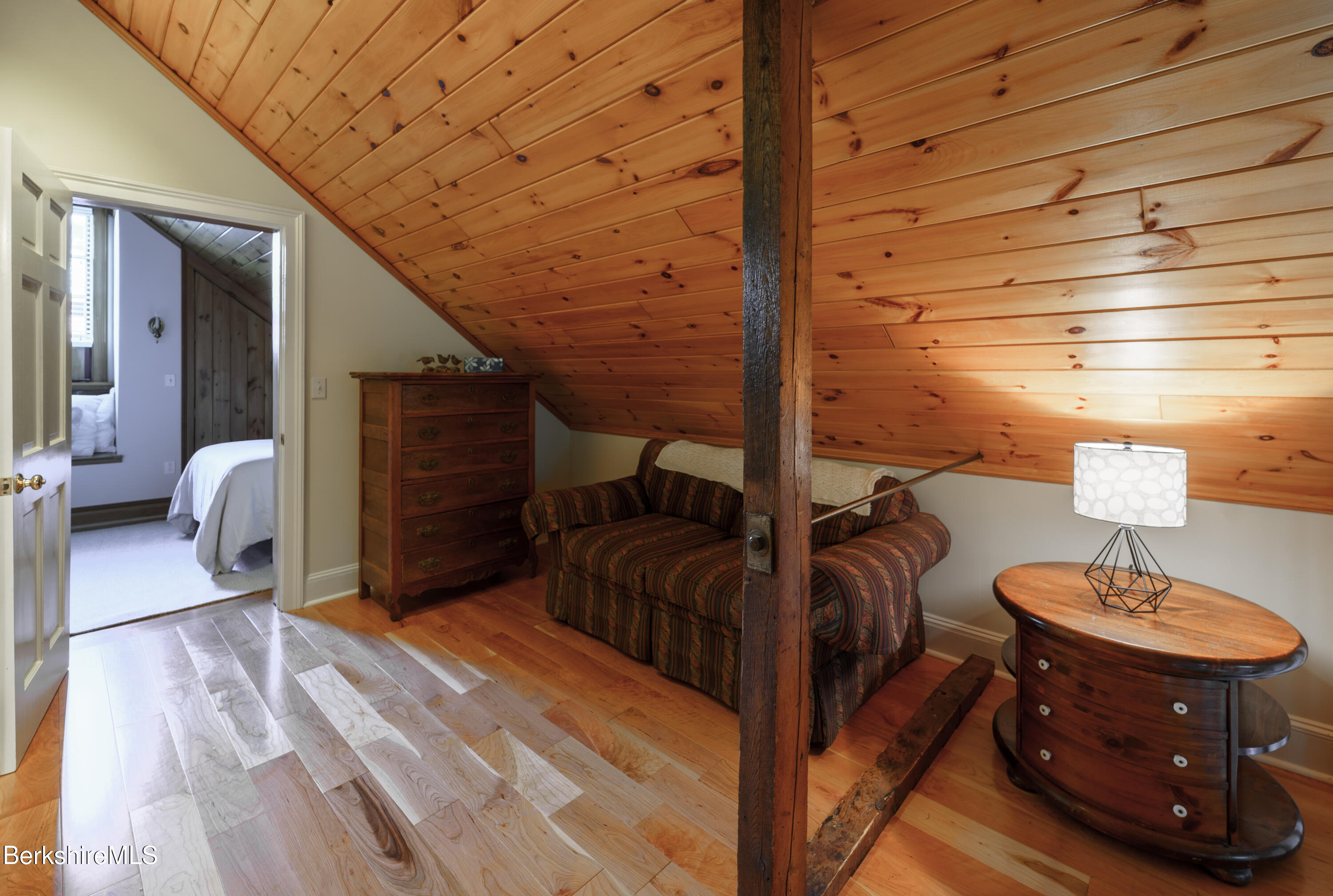 45 Taconic Avenue Lenox, MA 01240 - Photo 15 of 26 a bedroom with furniture and a mirror