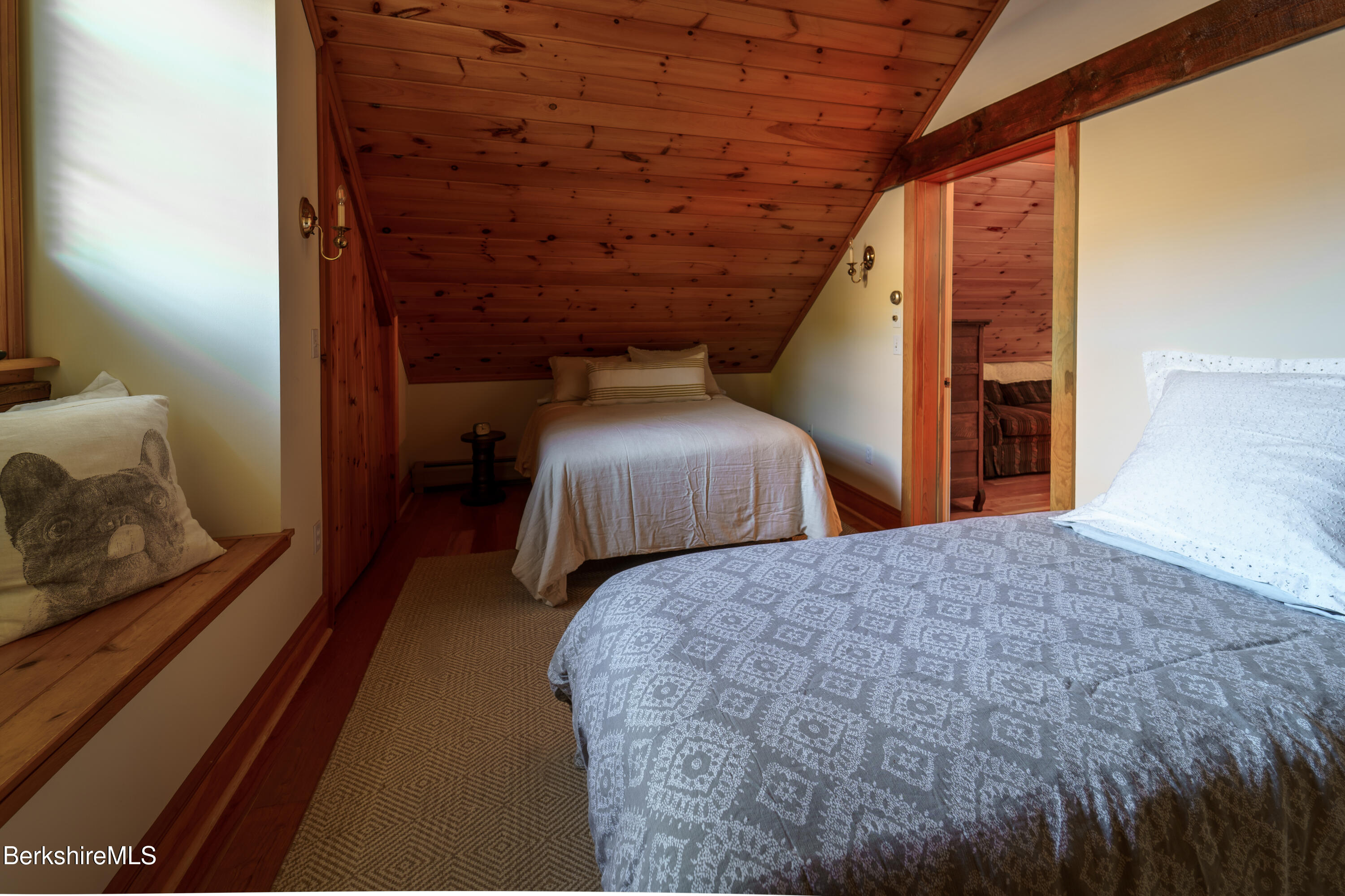 45 Taconic Avenue Lenox, MA 01240 - Photo 19 of 26 a bedroom with bed and wooden floor