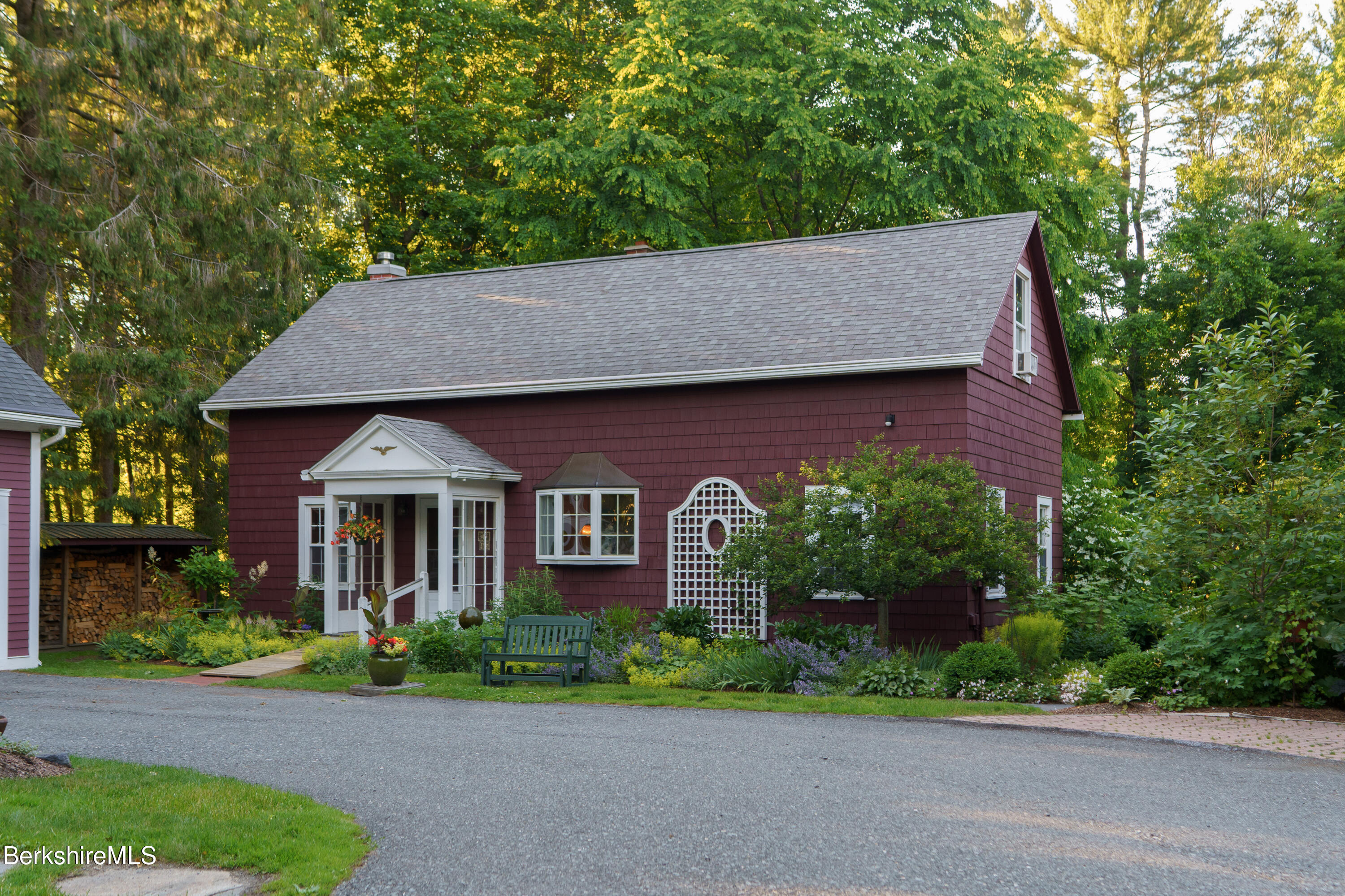 45 Taconic Avenue Lenox, MA 01240 - Photo 26 of 26 a front view of a house with a yard and trees