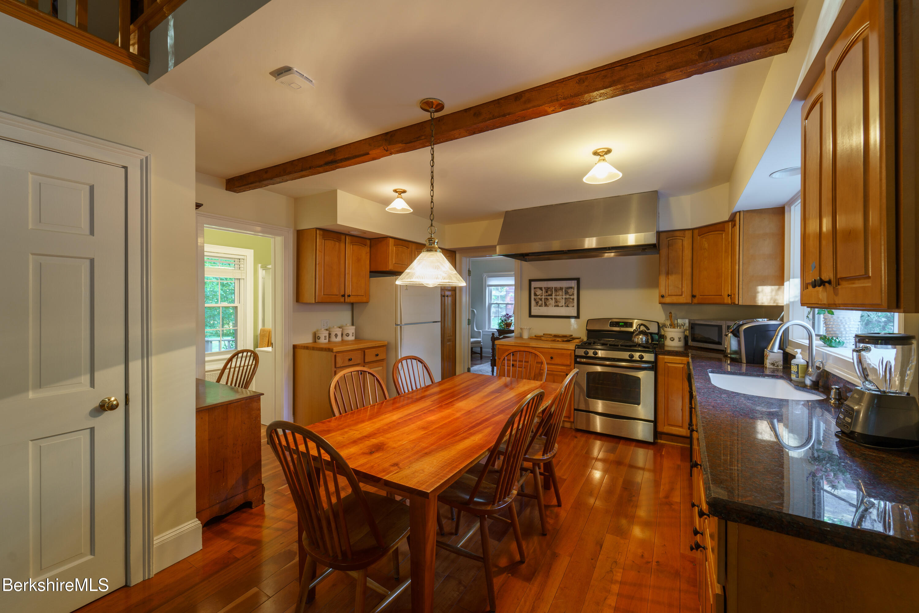 45 Taconic Avenue Lenox, MA 01240 - Photo 4 of 26 a view of a dining room with furniture and a large window