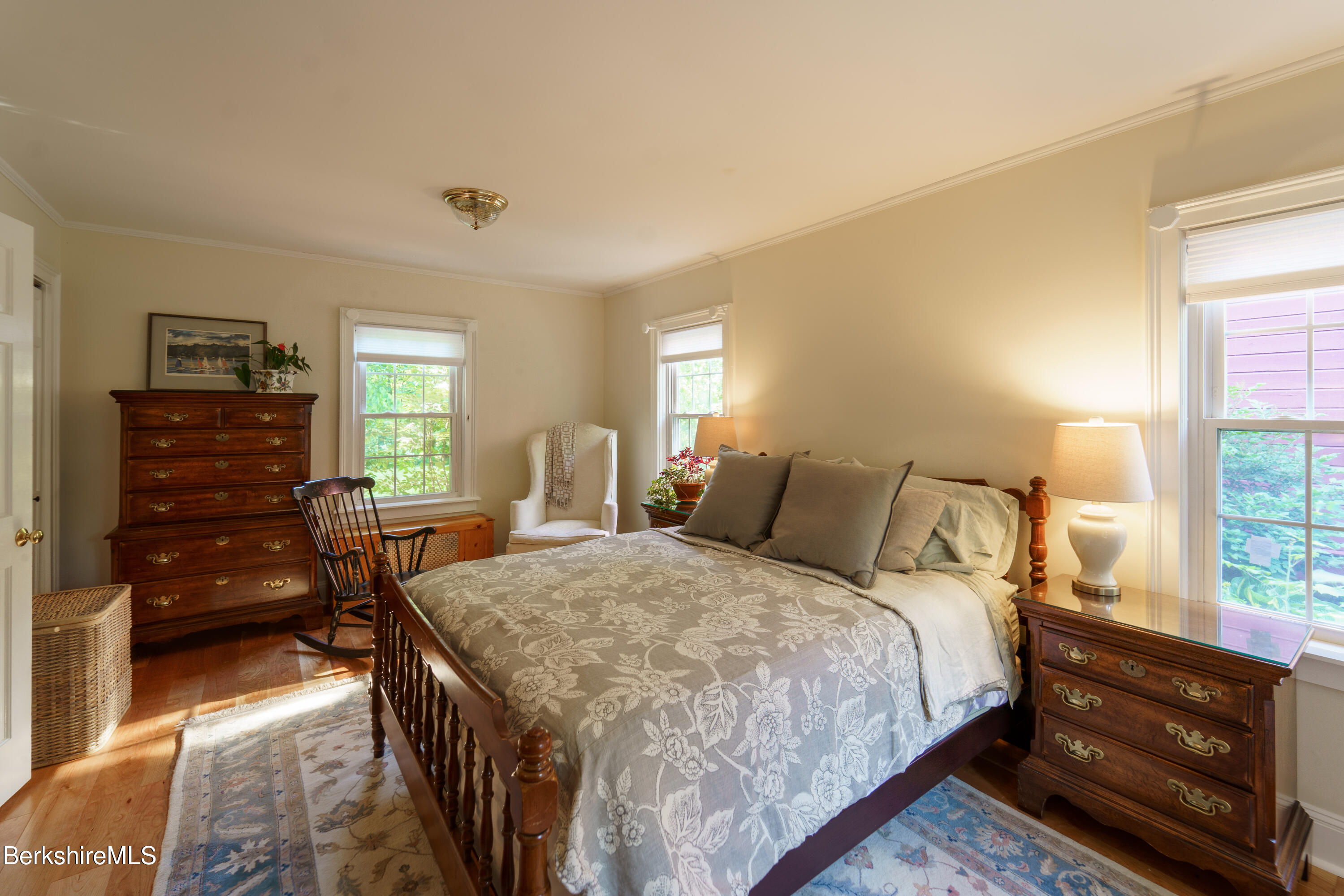 45 Taconic Avenue Lenox, MA 01240 - Photo 7 of 26 a bedroom with a bed and a dresser