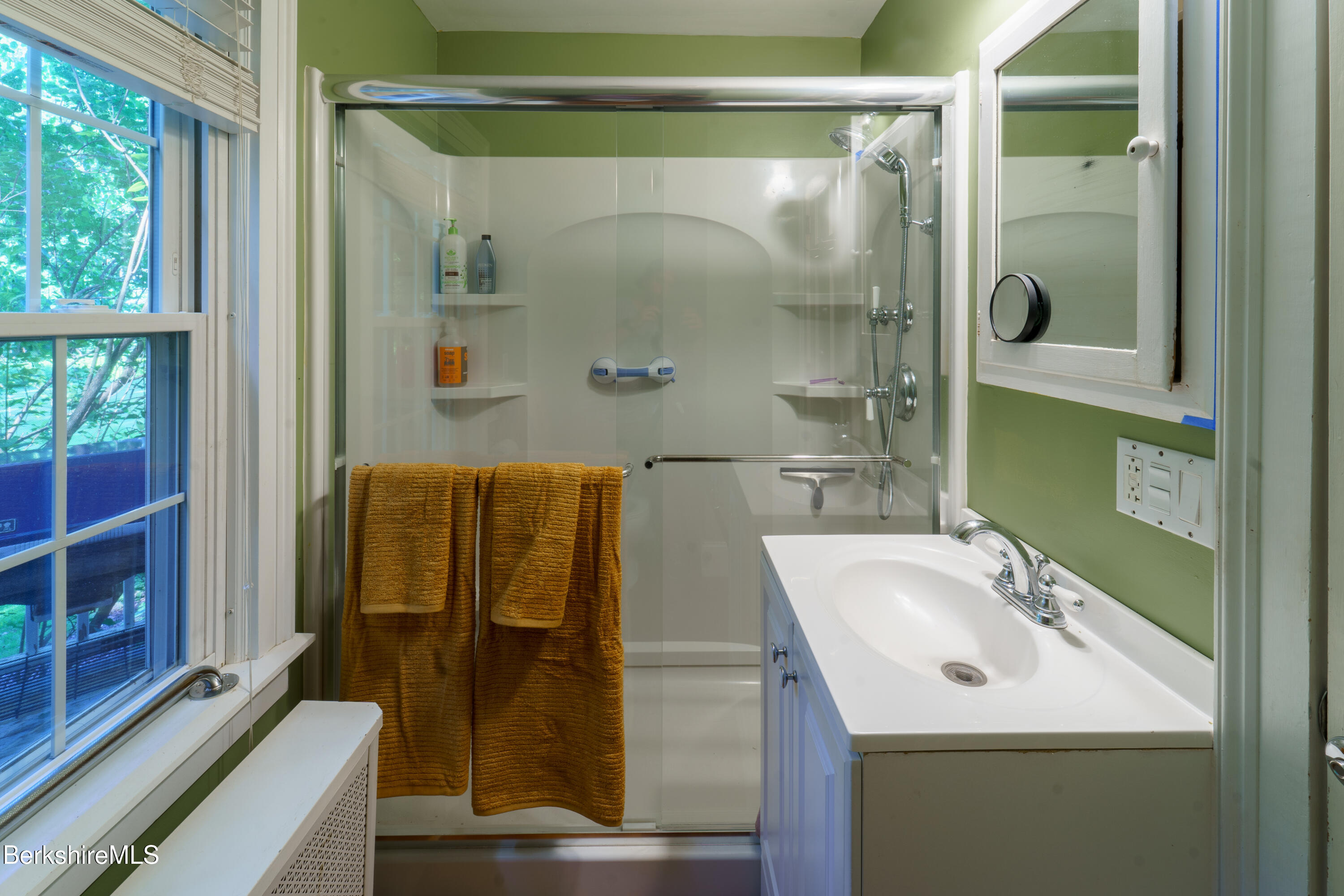 45 Taconic Avenue Lenox, MA 01240 - Photo 9 of 26 a bathroom with a sink and mirror