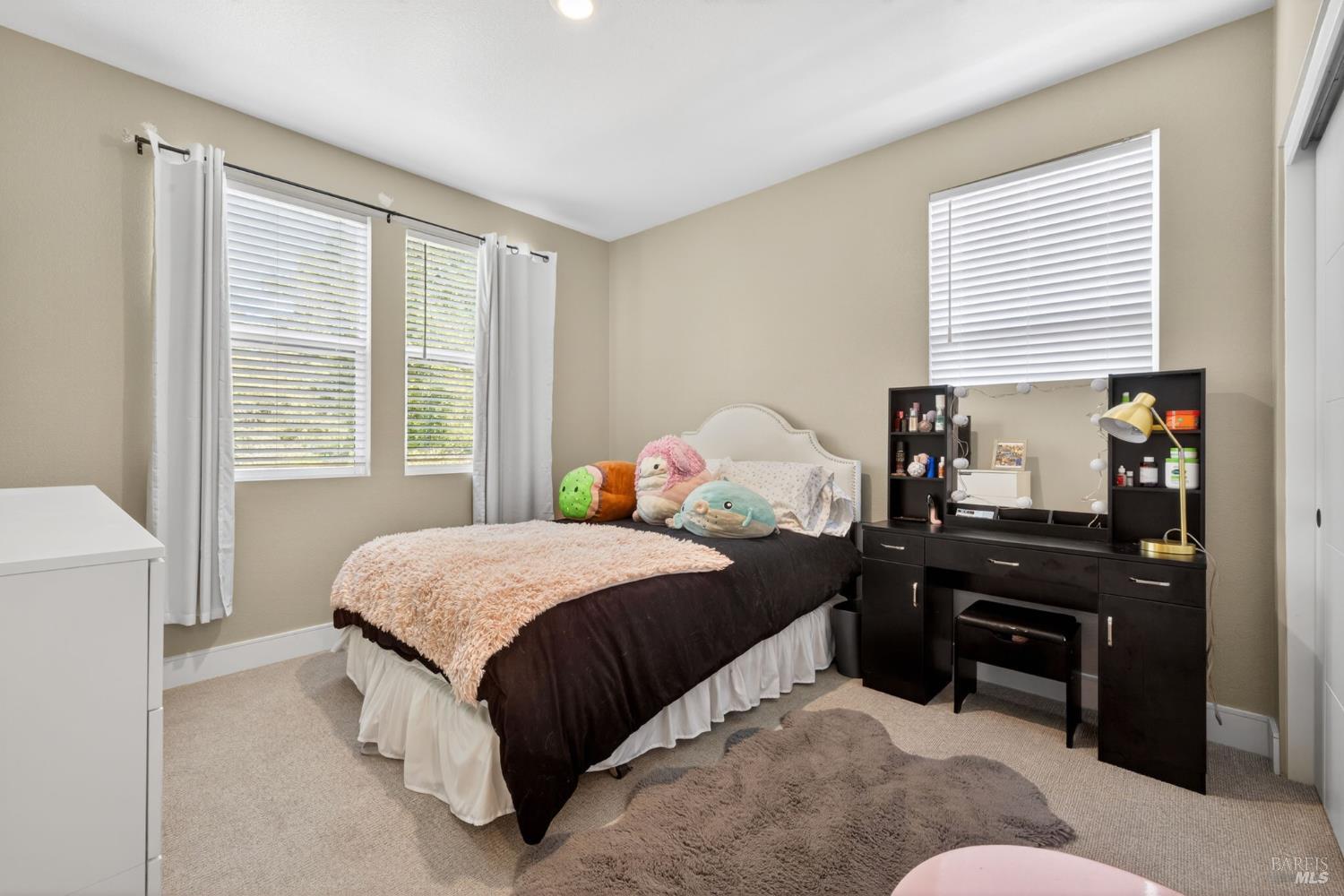 2215-2217 Versaro Drive Santa Rosa, CA 95403 - Photo 27 of 45 a bedroom with a bed and a closet