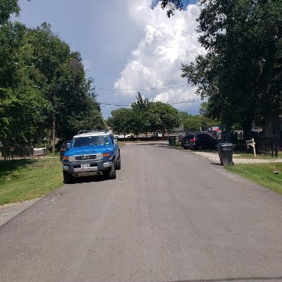 408 Robert Lee Road Houston, TX 77009 - Photo 10 of 13 a car parked on the side of the road