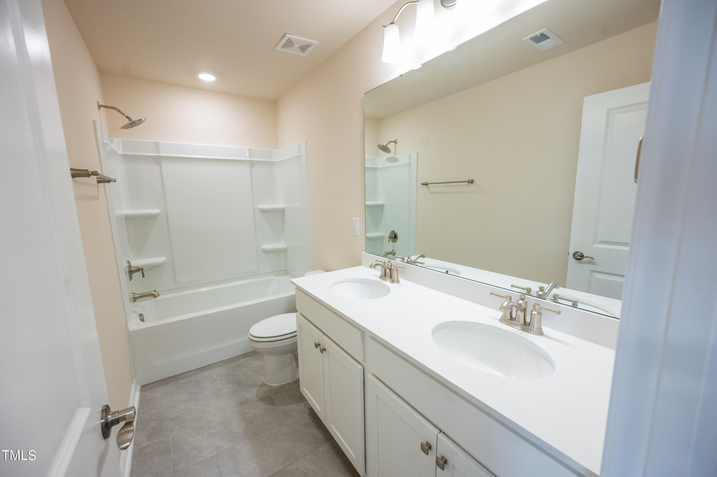 5716 Agrinio Way Raleigh, NC 27603 - Photo 21 of 25 Secondary Bathroom