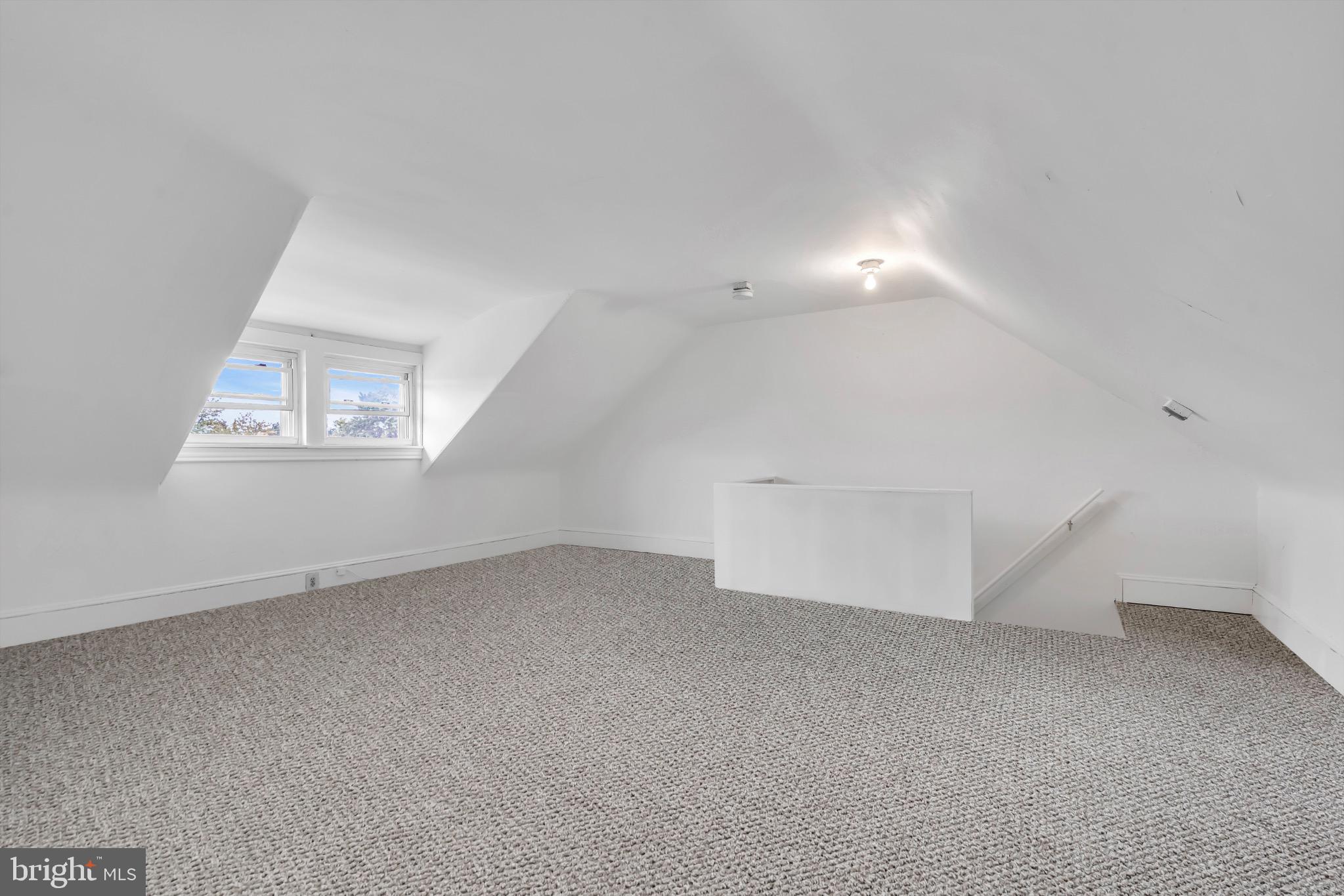 503 Kossuth Street Riverside, NJ 08075 - Photo 17 of 18 an empty room with a empty space and windows