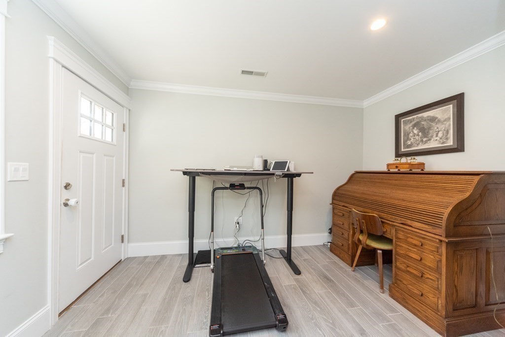 156 Ash Street, Unit 2 Waltham, MA 02453 - Photo 36 of 39 a room with a bed and a window