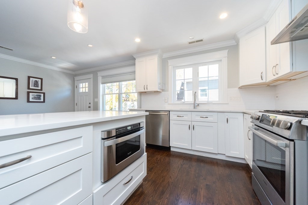 156 Ash Street, Unit 2 Waltham, MA 02453 - Photo 7 of 39 a kitchen with a stove oven and sink