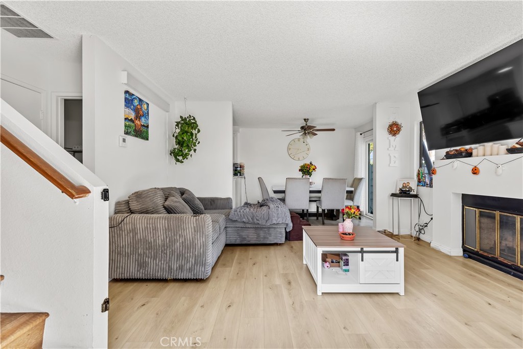 8784 Hewitt Place, Unit 12 Garden Grove, CA 92844 - Photo 23 of 54 a living room with furniture and a flat screen tv