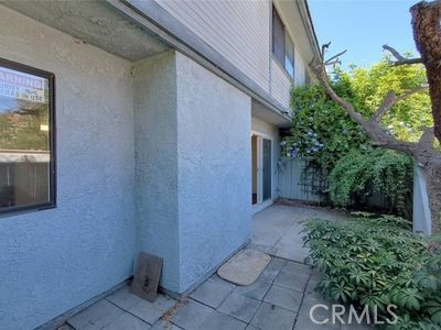 8784 Hewitt Place, Unit 12 Garden Grove, CA 92844 - Photo 3 of 54 a view of a backyard