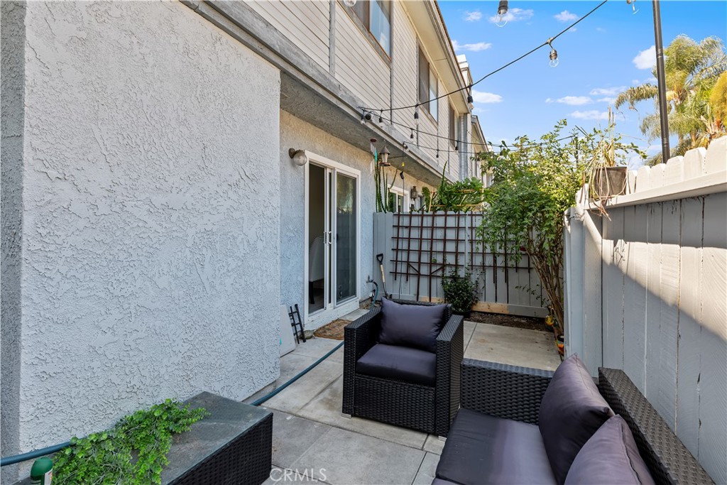 8784 Hewitt Place, Unit 12 Garden Grove, CA 92844 - Photo 33 of 54 a view of a patio with couches and potted plants