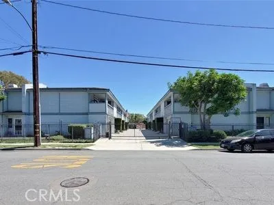 a view of a house with a street