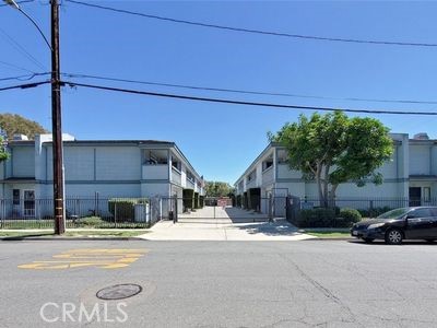 8784 Hewitt Place, Unit 12 Garden Grove, CA 92844 - Photo 4 of 54 a view of a house with a street