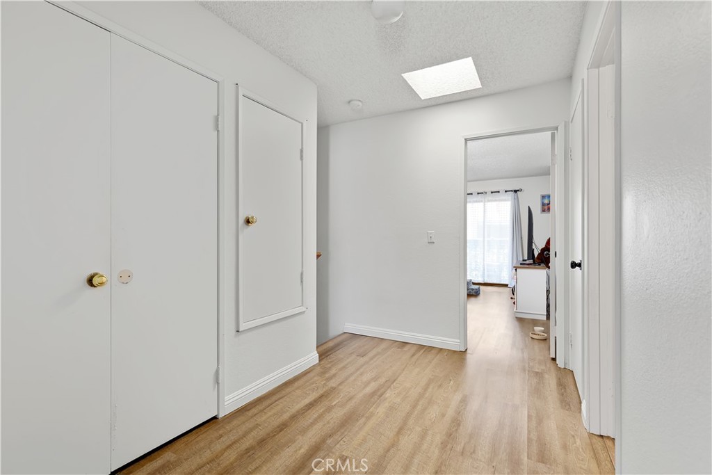 8784 Hewitt Place, Unit 12 Garden Grove, CA 92844 - Photo 47 of 54 a view of wooden floor in an empty room