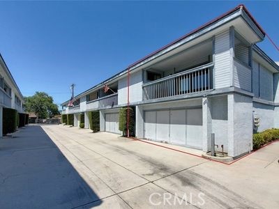 8784 Hewitt Place, Unit 12 Garden Grove, CA 92844 - Photo 6 of 54 a view of a house with a yard