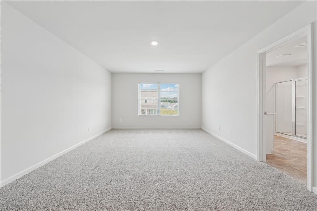 96 Quail Bend Way Dallas, GA 30157 - Photo 21 of 57 an empty room with windows