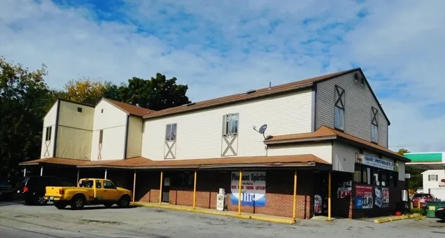 a view of a car park in front of building
