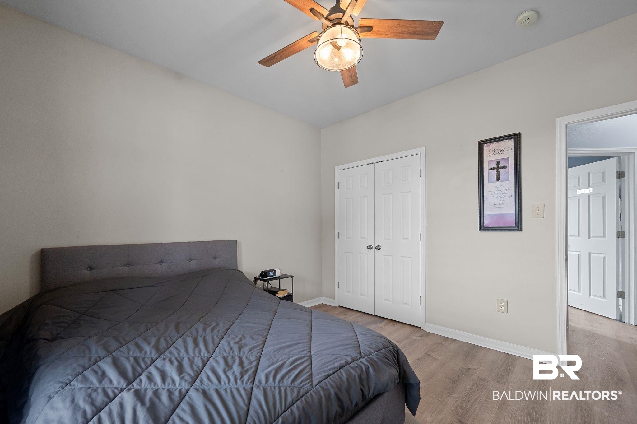 1287 Pembroke Way Foley, AL 36535 - Photo 26 of 39 Bedroom featuring wood finished floors, ceiling fan, and a closet