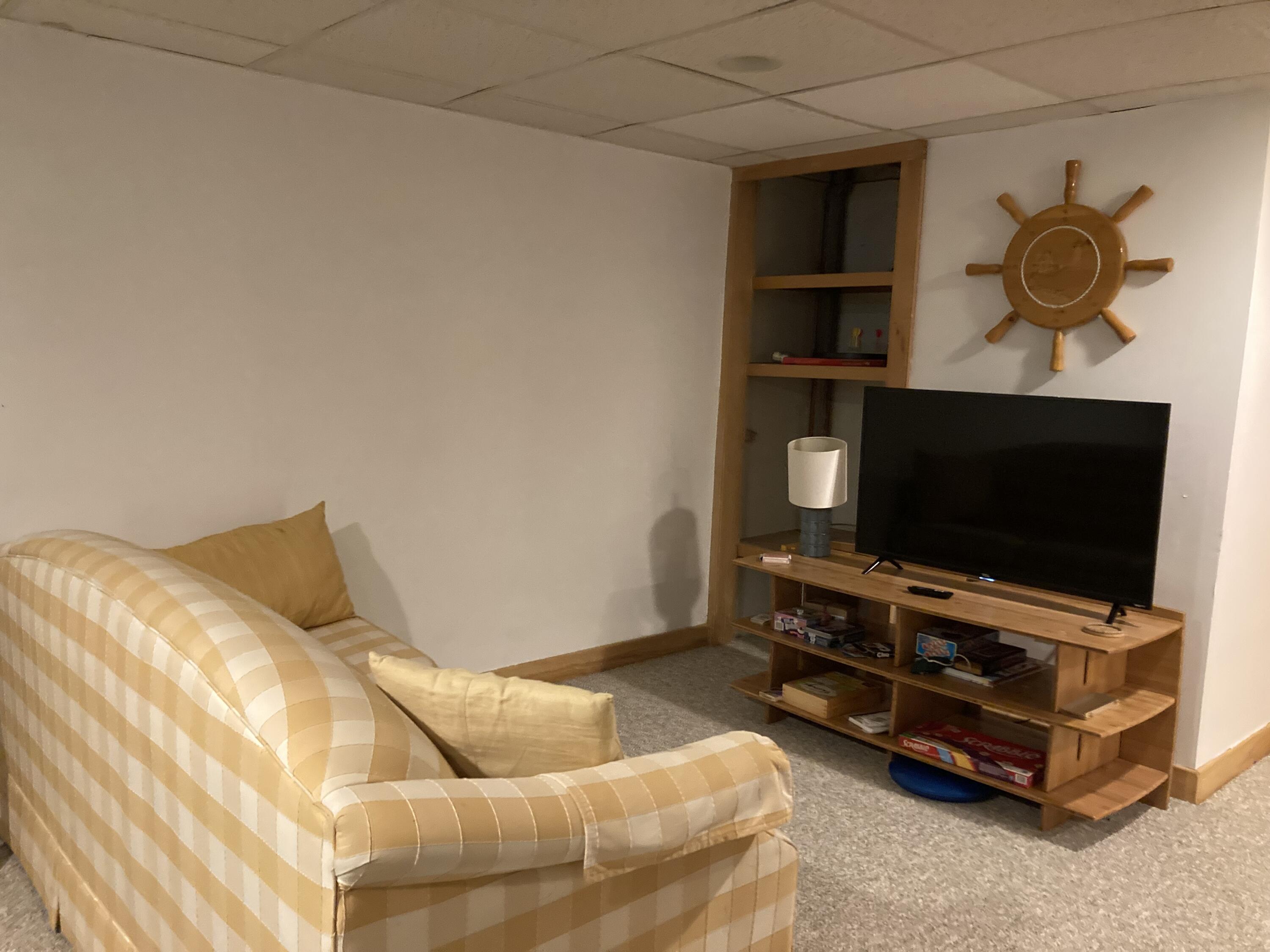 450 West Shore Road Sorrento, ME 04677 - Photo 18 of 25 TV & game room, basement.