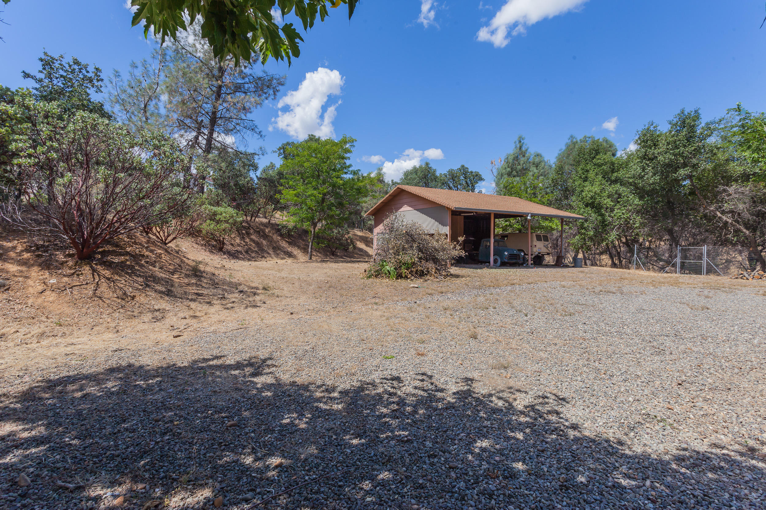 8680 Valley View Road Redding, CA 96001 - Photo 29 of 33 a view of a large tree with a yard