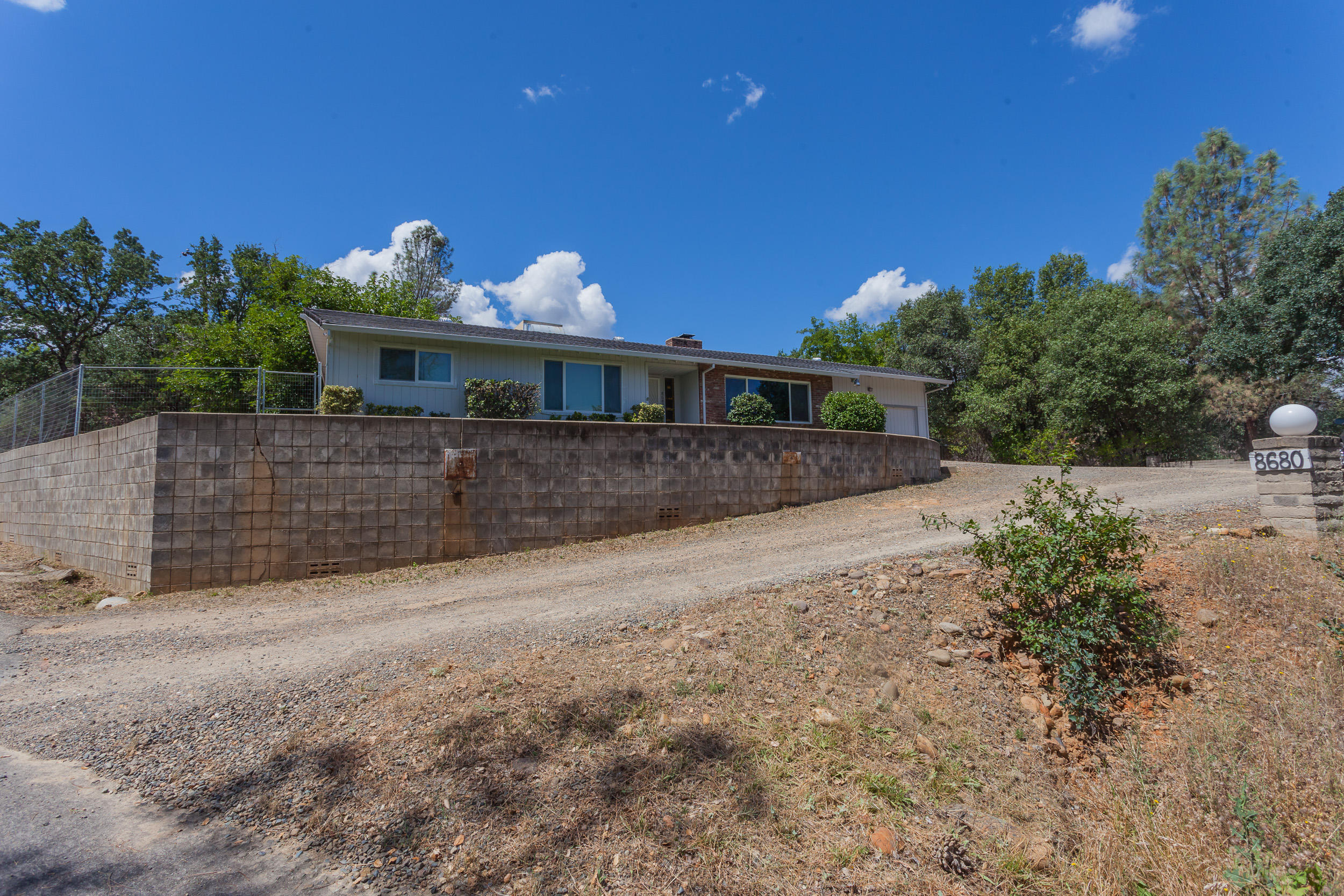 8680 Valley View Road Redding, CA 96001 - Photo 32 of 33 a front view of a house with a yard