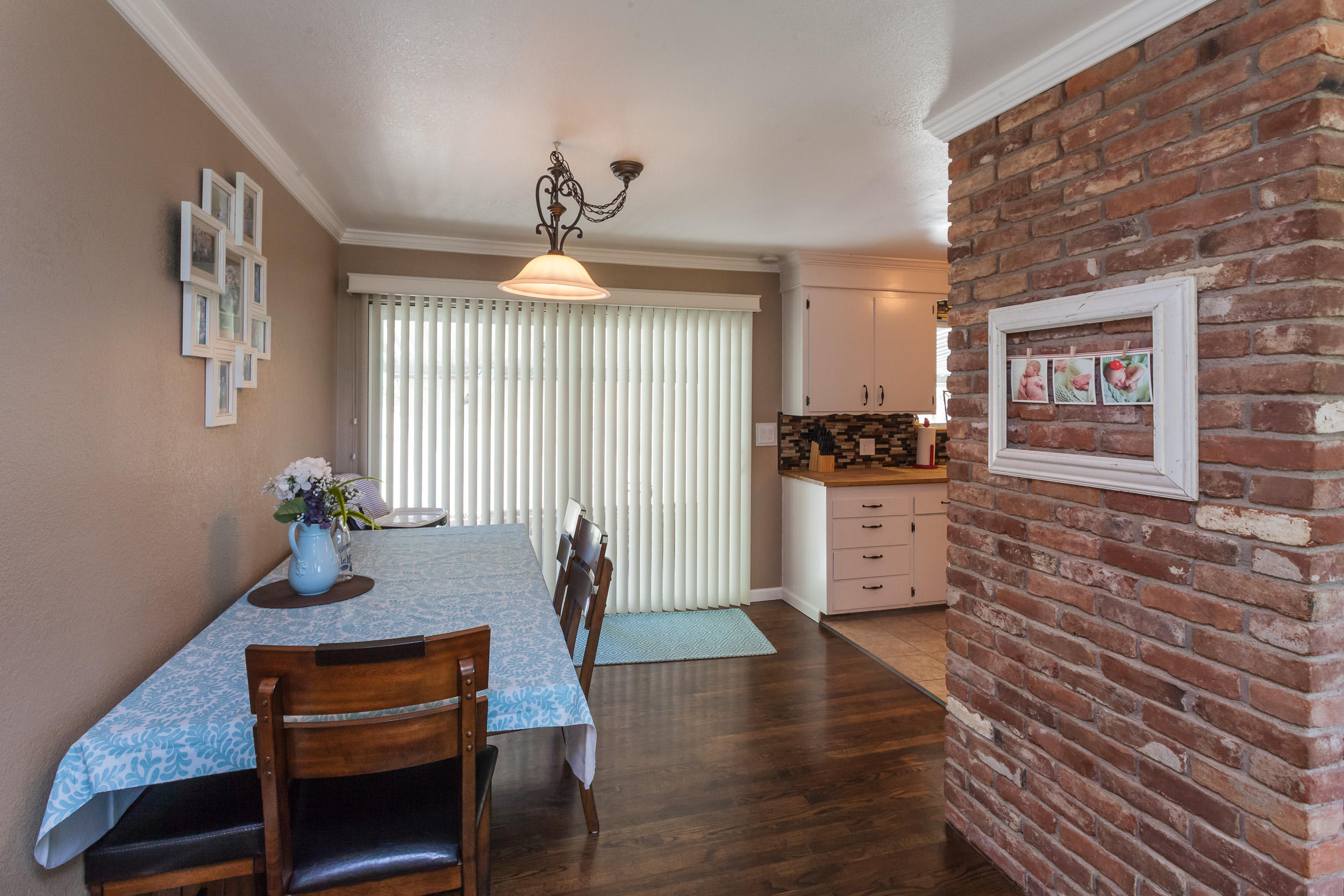 8680 Valley View Road Redding, CA 96001 - Photo 7 of 33 a living room with furniture and wooden floor