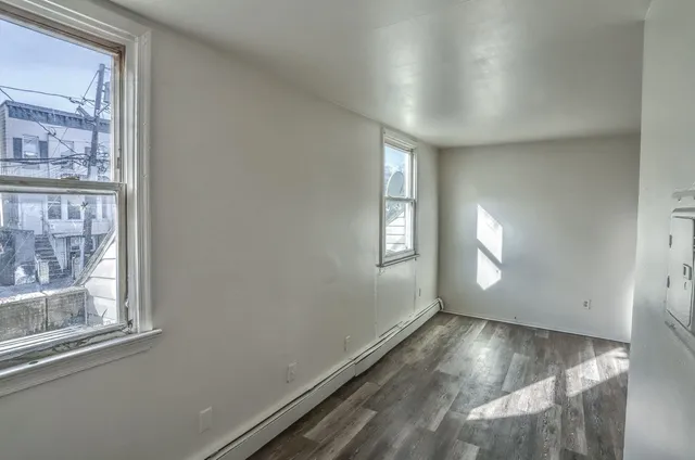 an empty room with windows