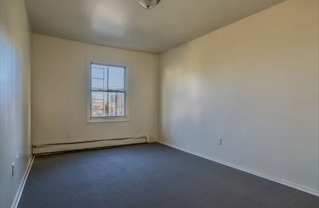 an empty room with a window