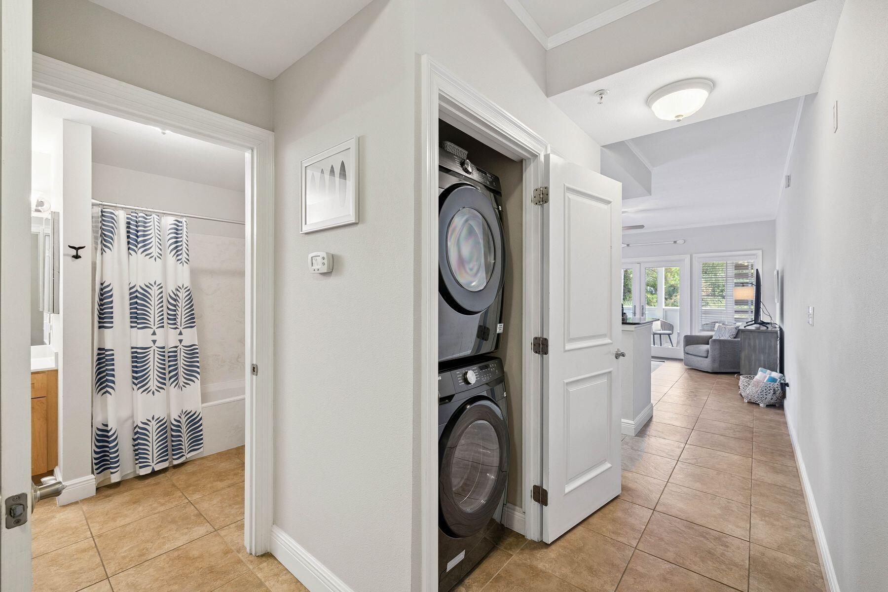 43 Cassine Way, Unit 207 Santa Rosa Beach, FL 32459 - Photo 16 of 28 a view of a storage and utility room with washer and dryer