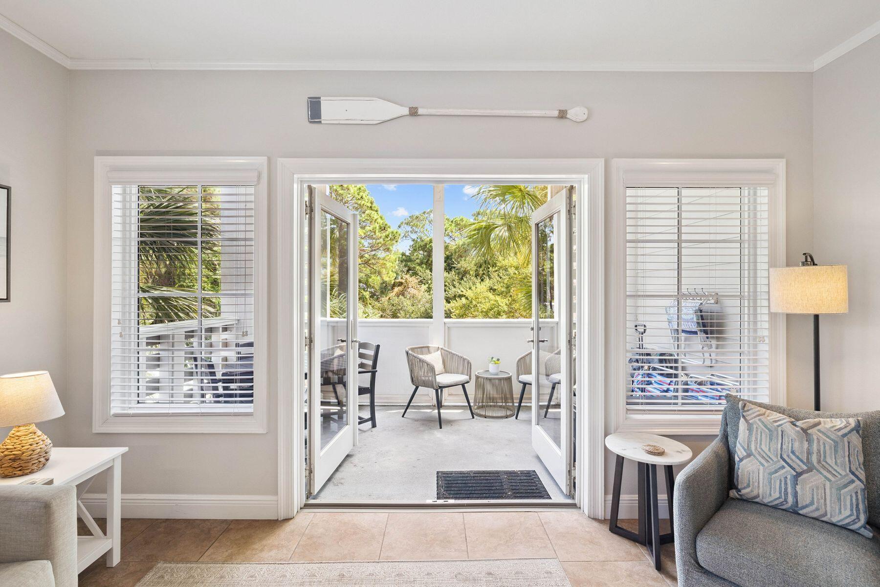 43 Cassine Way, Unit 207 Santa Rosa Beach, FL 32459 - Photo 2 of 28 a living room with furniture and a window