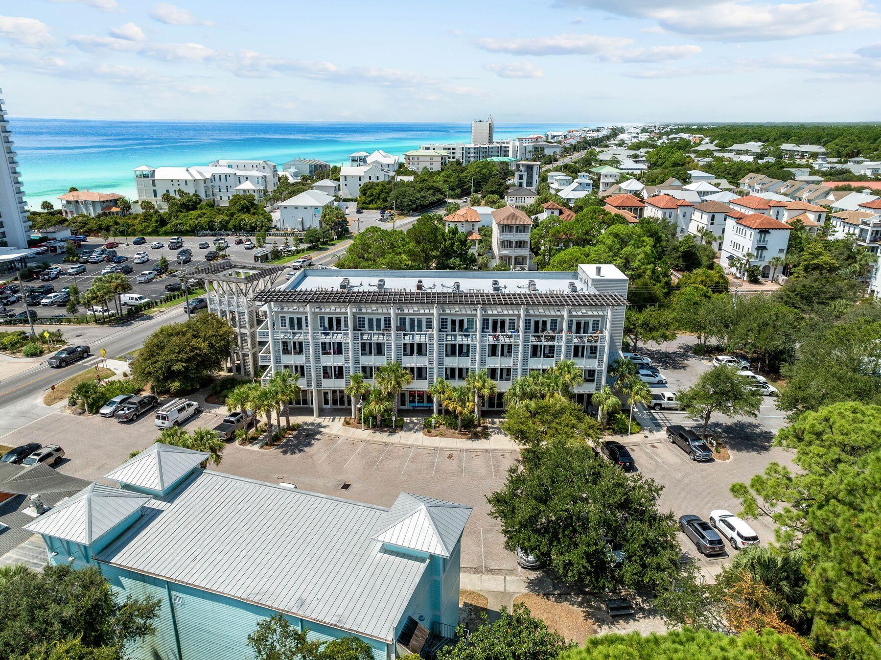 43 Cassine Way, Unit 207 Santa Rosa Beach, FL 32459 - Photo 21 of 28 an aerial view of residential building with outdoor space