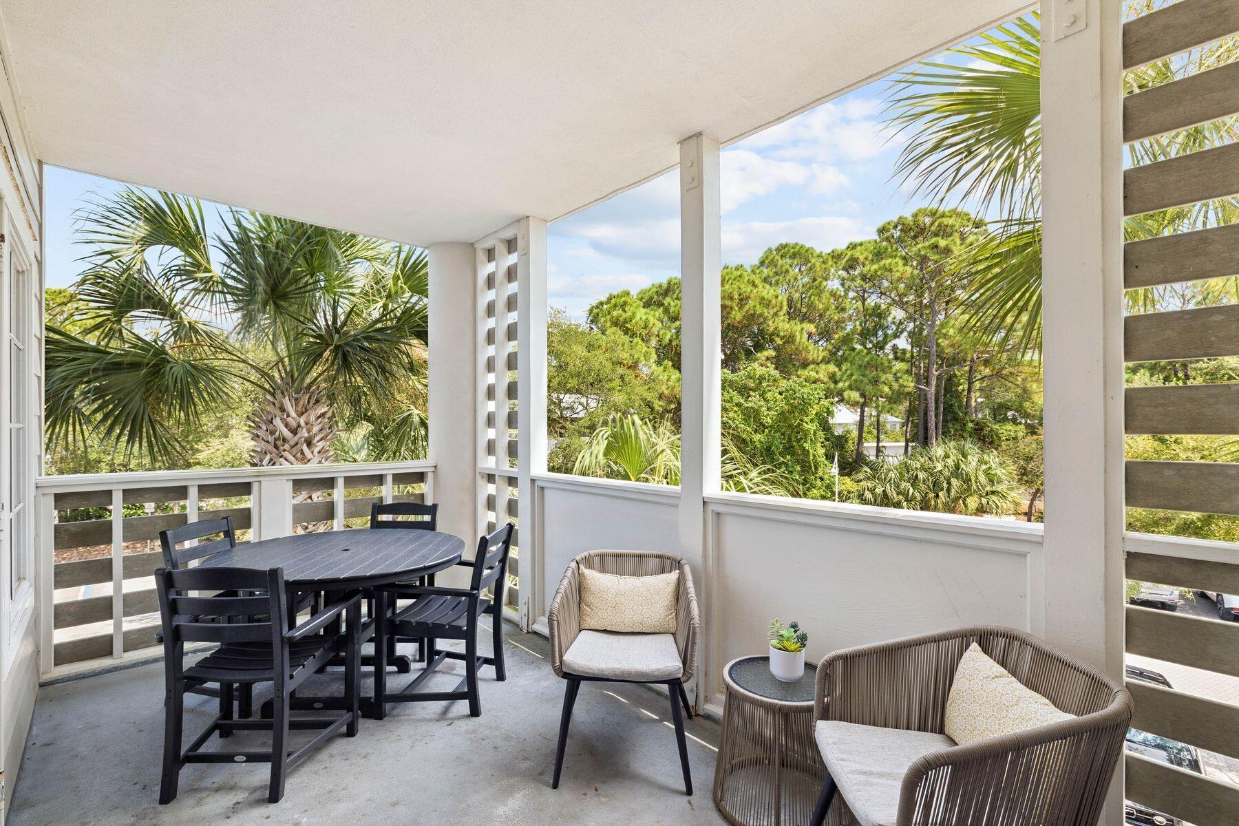 43 Cassine Way, Unit 207 Santa Rosa Beach, FL 32459 - Photo 9 of 11 a view of a dining room with furniture window and outside view