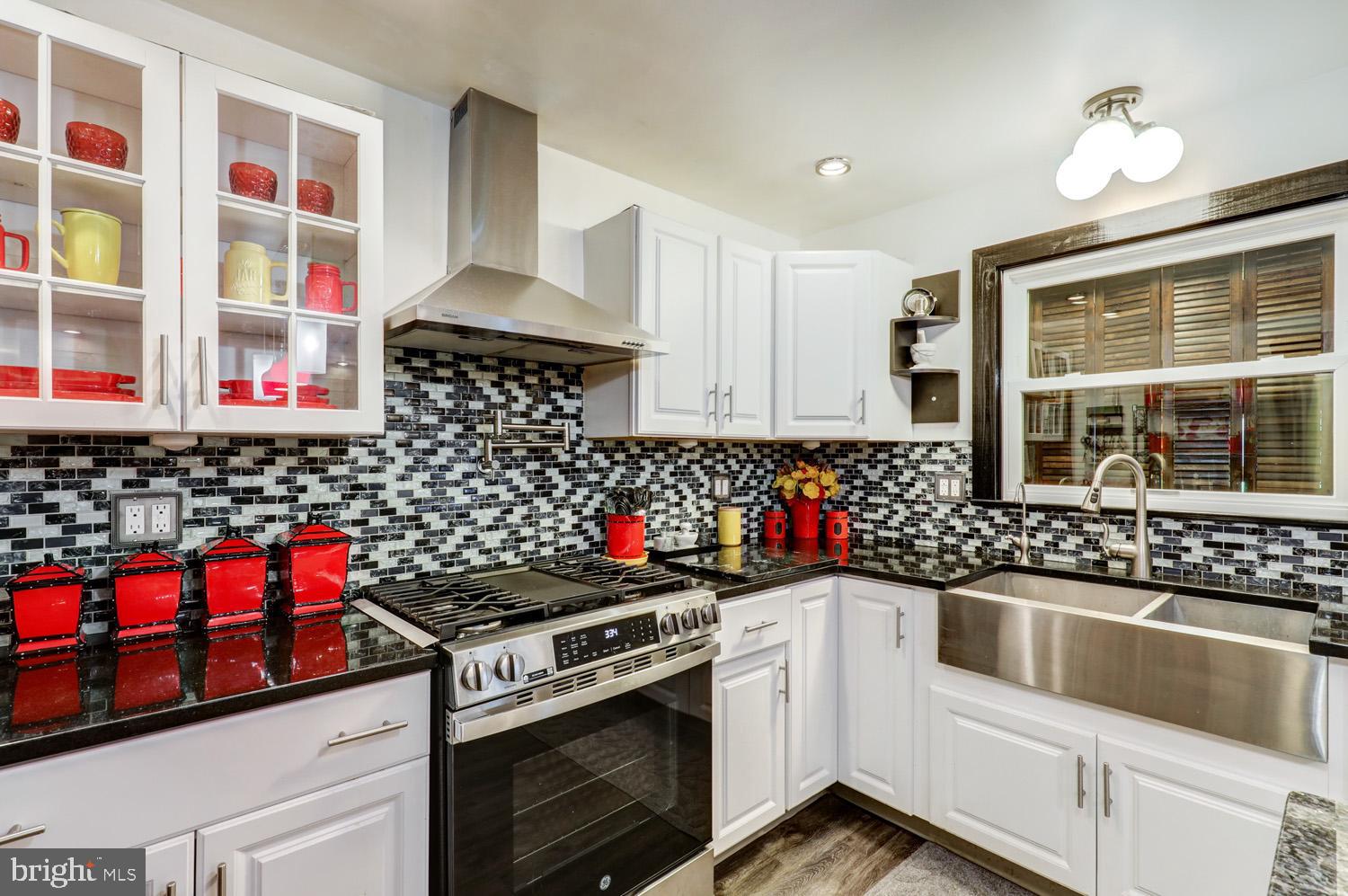 912 Perry Road Lititz, PA 17543 - Photo 13 of 50 a kitchen with stainless steel appliances a stove and a sink