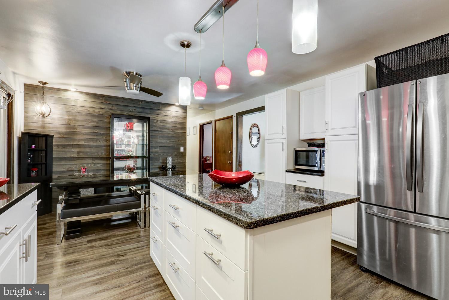 912 Perry Road Lititz, PA 17543 - Photo 14 of 50 a kitchen with stainless steel appliances granite countertop a refrigerator a stove and a sink