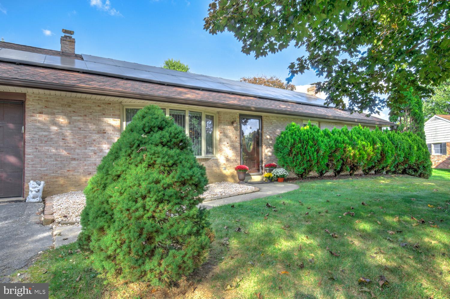 912 Perry Road Lititz, PA 17543 - Photo 2 of 50 a view of a porch with a backyard