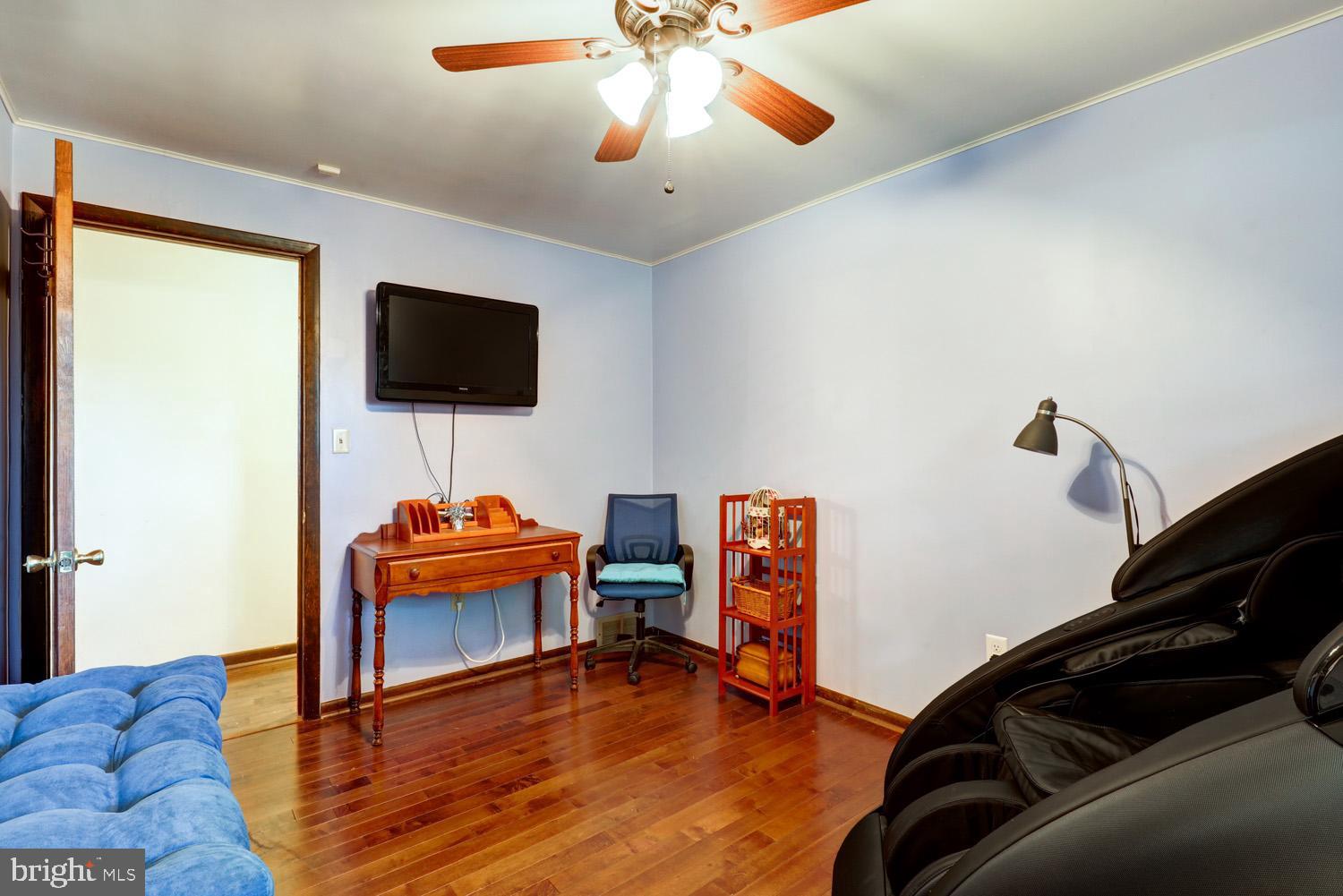 912 Perry Road Lititz, PA 17543 - Photo 24 of 50 a bedroom with furniture and a flat screen tv