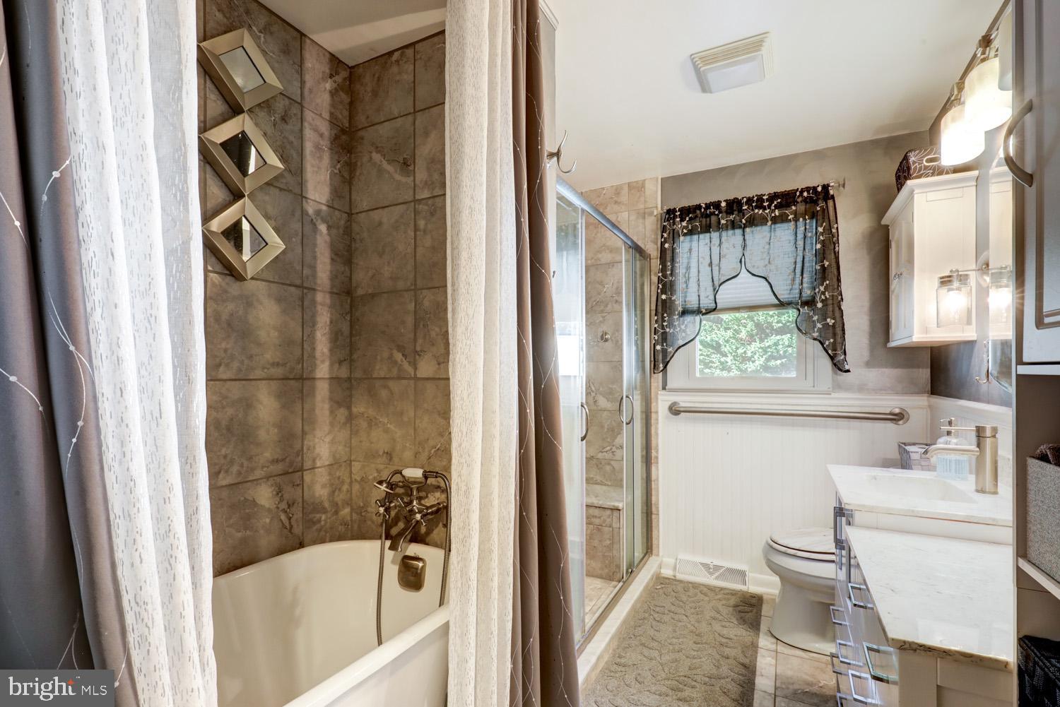 912 Perry Road Lititz, PA 17543 - Photo 25 of 50 a bathroom with a bathtub and a shower