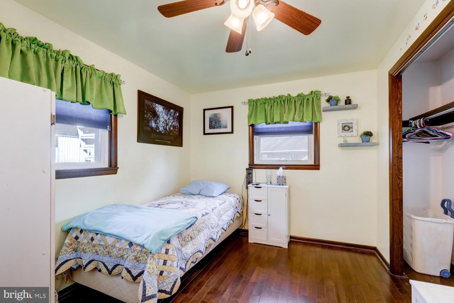 912 Perry Road Lititz, PA 17543 - Photo 31 of 50 a bedroom with a bed and a flat screen tv