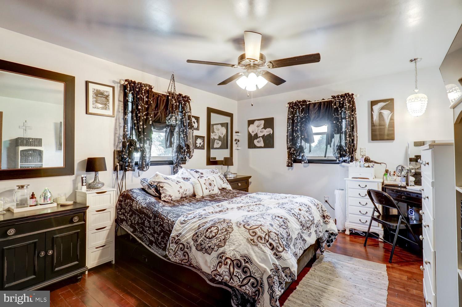 912 Perry Road Lititz, PA 17543 - Photo 33 of 50 a bedroom with bed and wooden floor