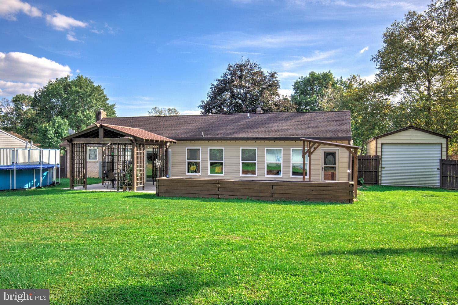 912 Perry Road Lititz, PA 17543 - Photo 41 of 50 a front view of a house with a yard and trees