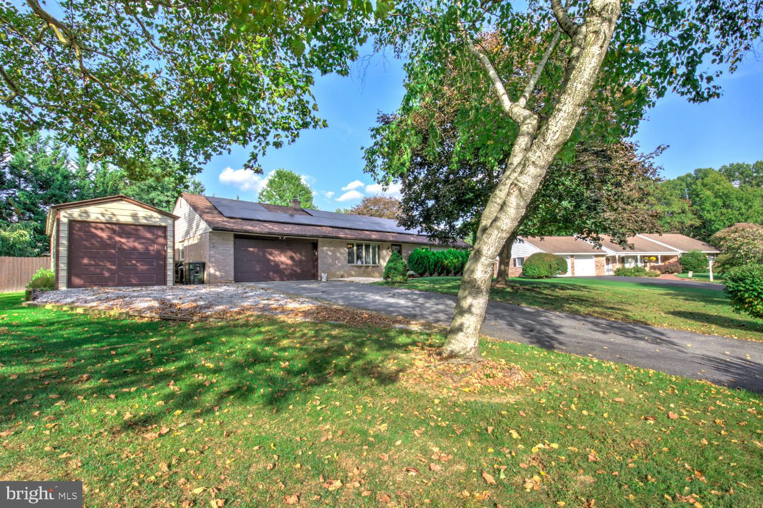 912 Perry Road Lititz, PA 17543 - Photo 45 of 50 a view of a house with backyard and a tree