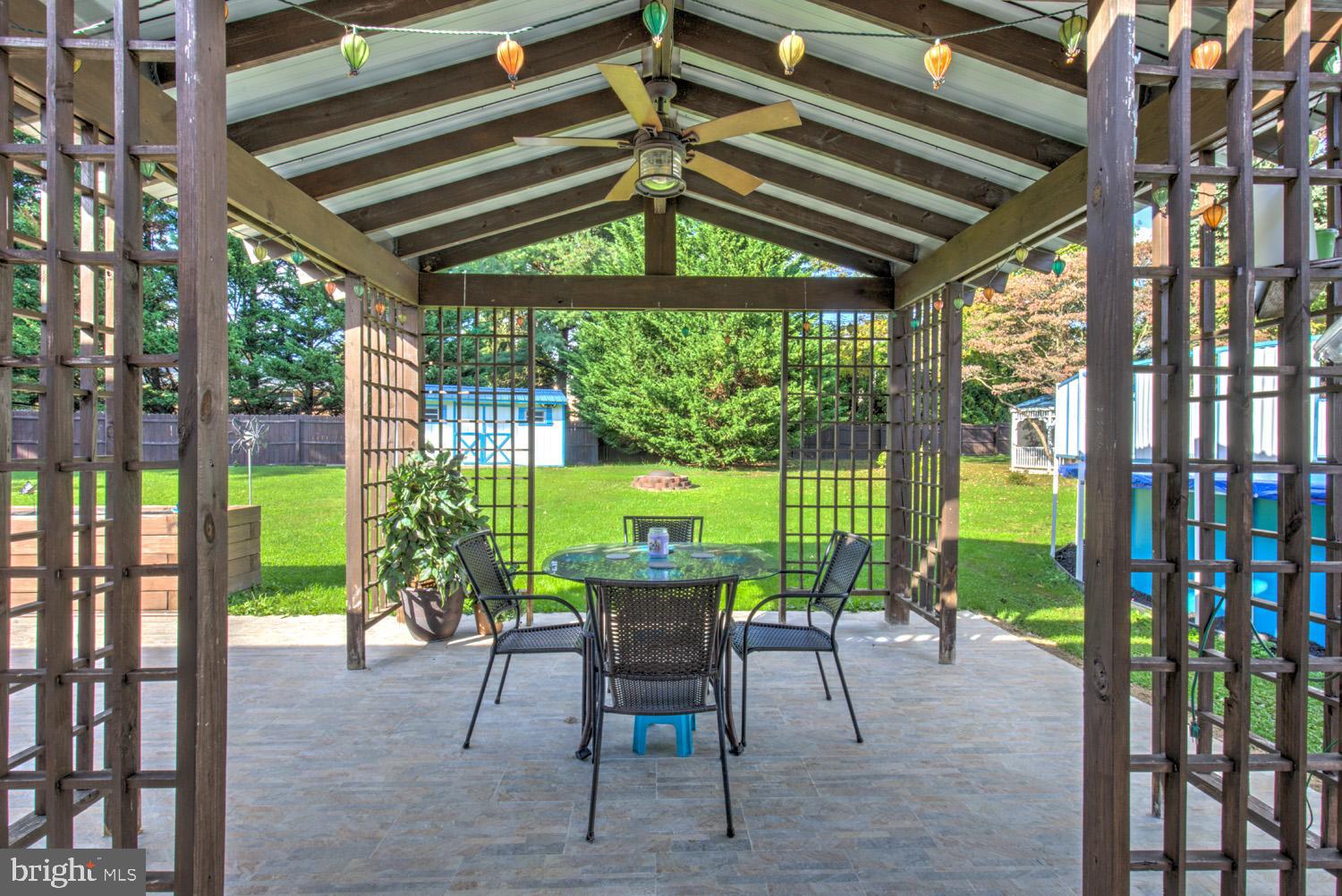 912 Perry Road Lititz, PA 17543 - Photo 5 of 50 a view of a porch with chairs and backyard